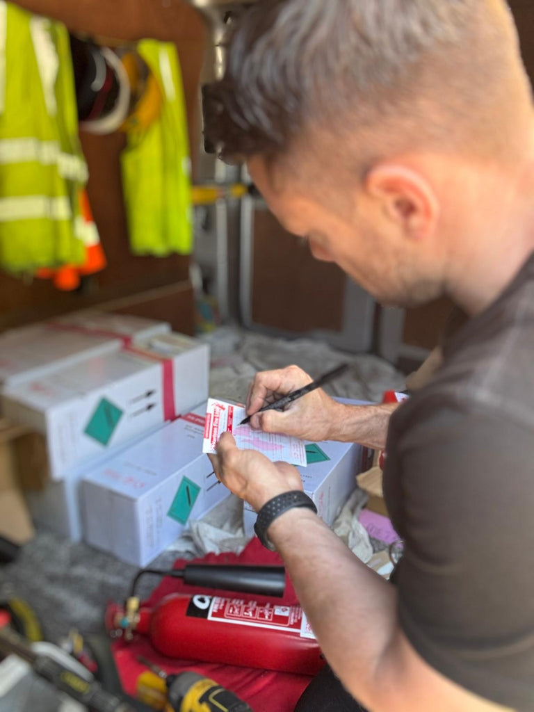 What Happens During a Fire Extinguisher Service with Hartson Fire?